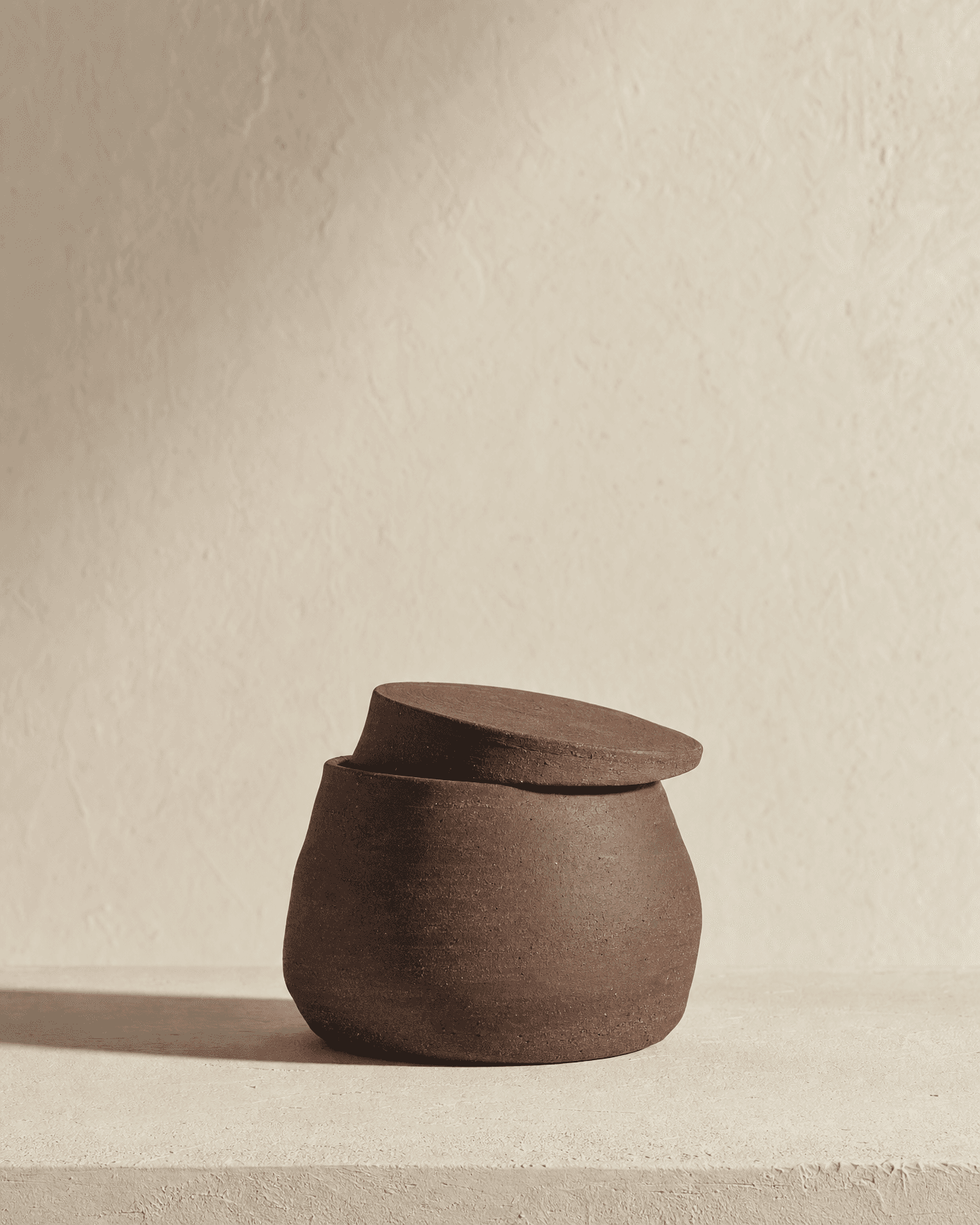 leaning jar, iron oxide clay